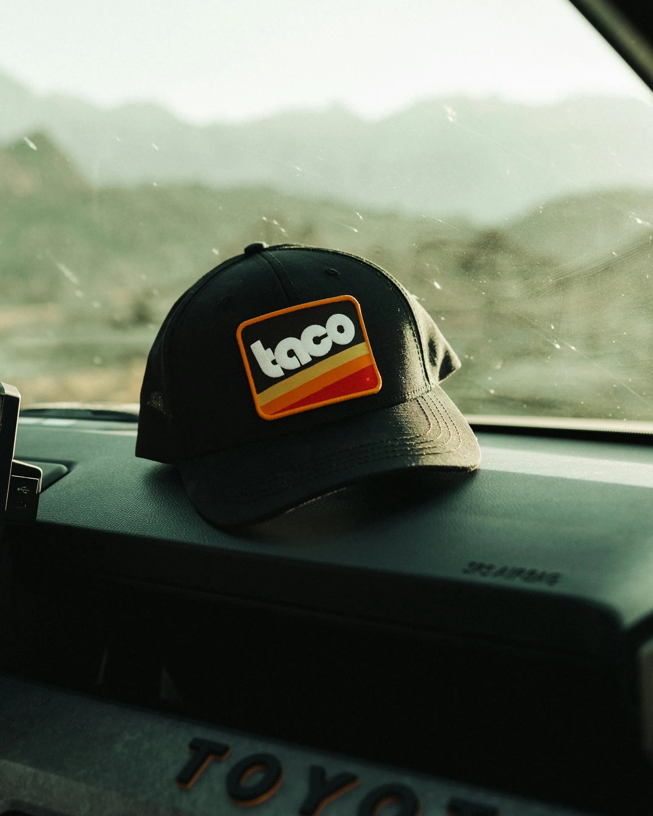 huckberry taco hat on a toyota dashboard