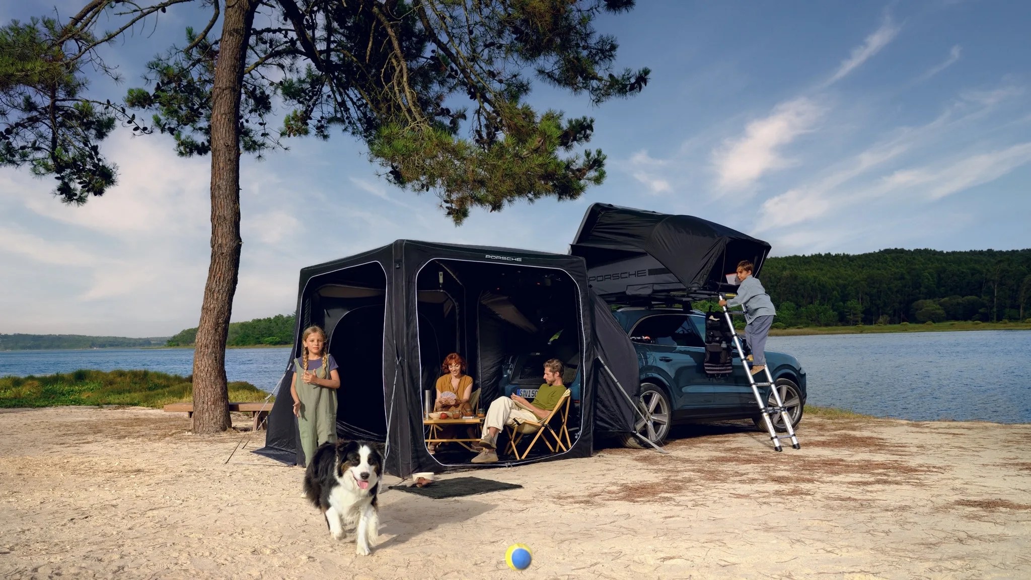 family using porsche tents on a beach