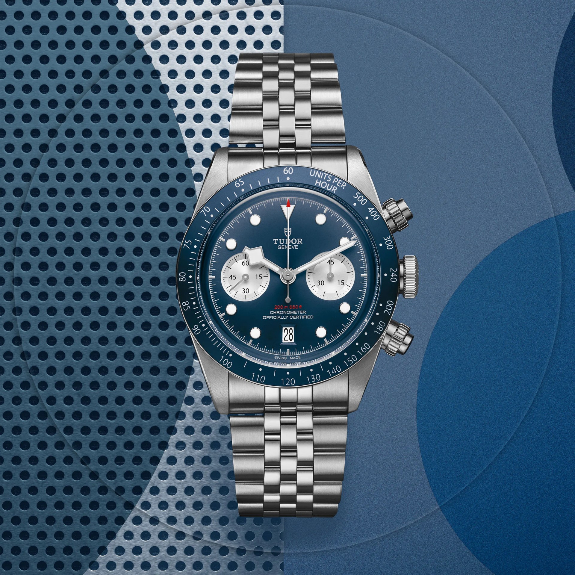 tudor watch on a blue patterned background