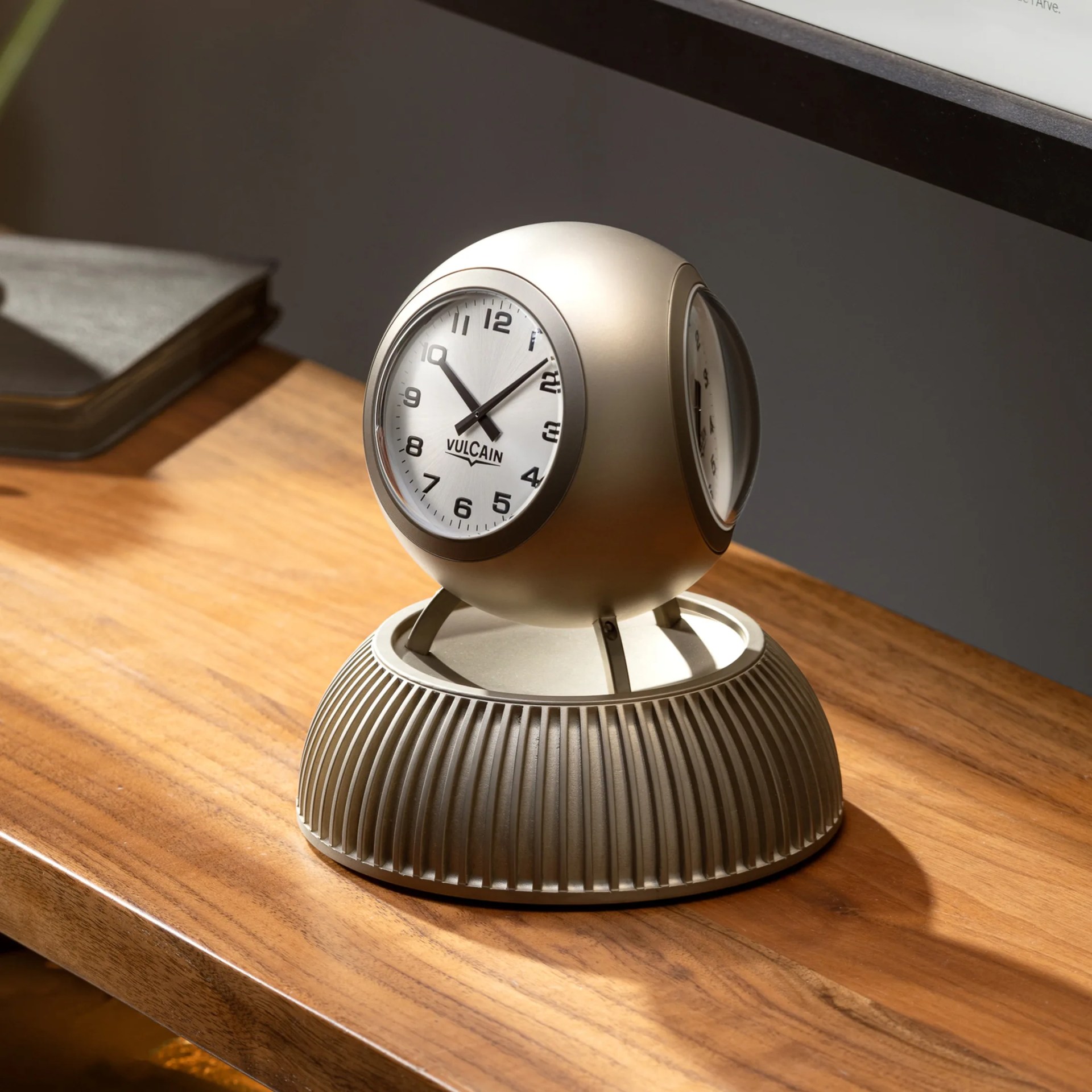 vulcain table clock on a desk