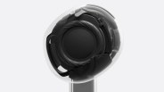 X-Ray view of the internal driver components in a single Apple AirPods 4 wireless earbuds on white