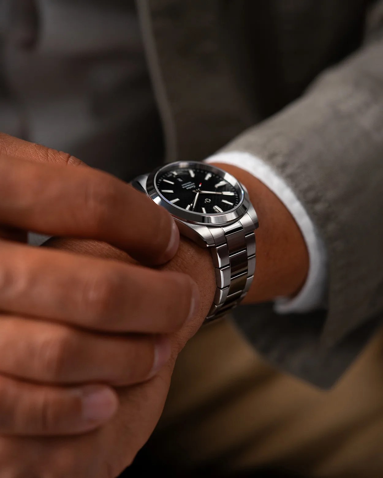 A Jack Mason Canton watch on a person's wrist
