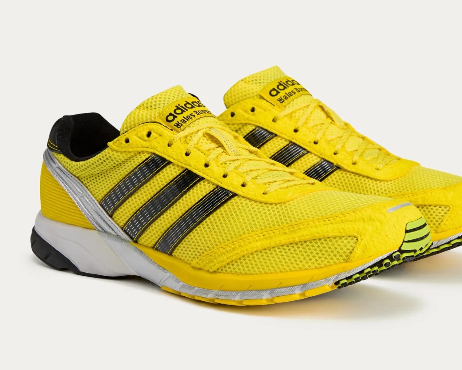 yellow adidas running shoes
