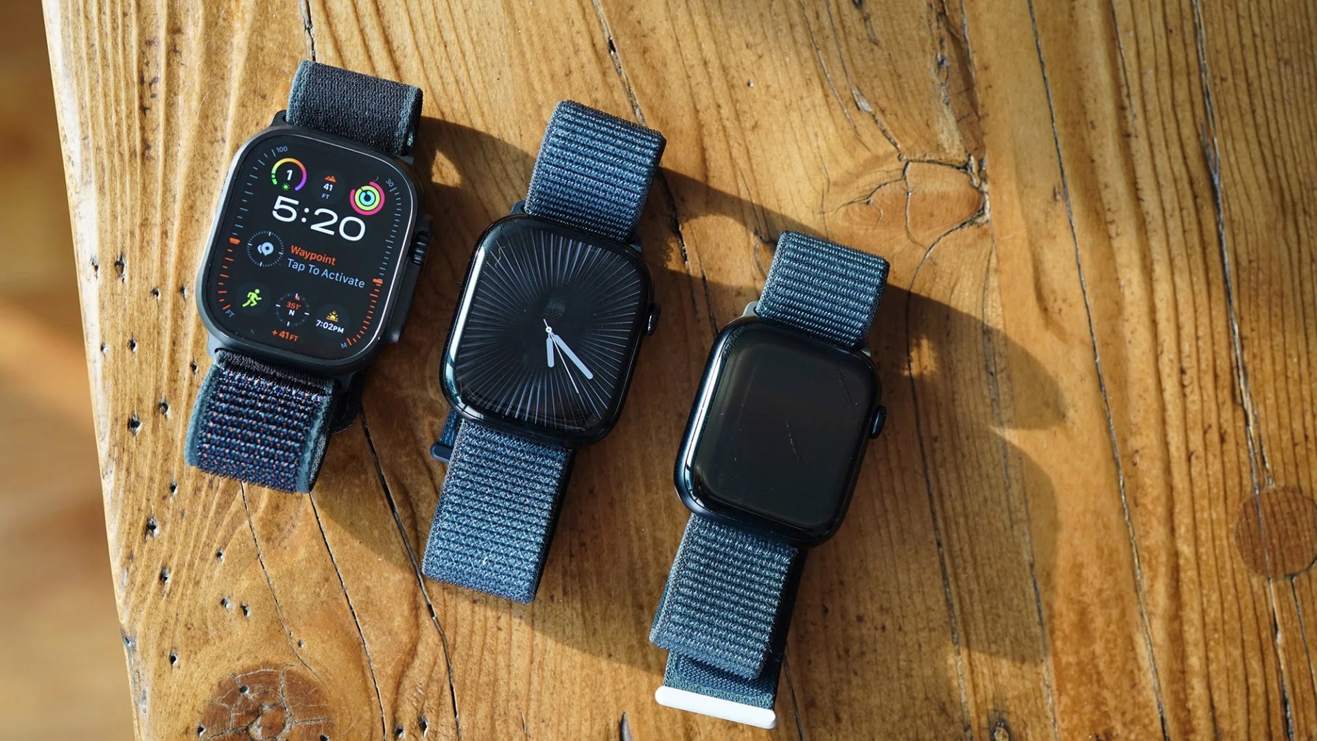 Apple Watch comparison: Ultra 2 (in black), Series 10 and SE 2