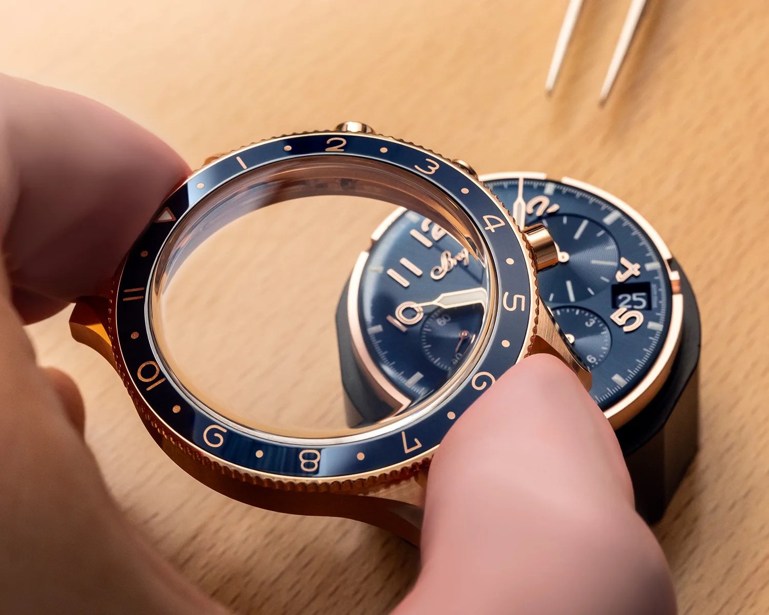 a breguet watch being assembled