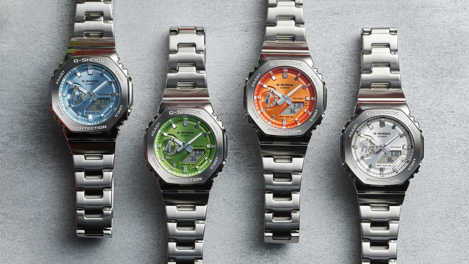four watches on silver material
