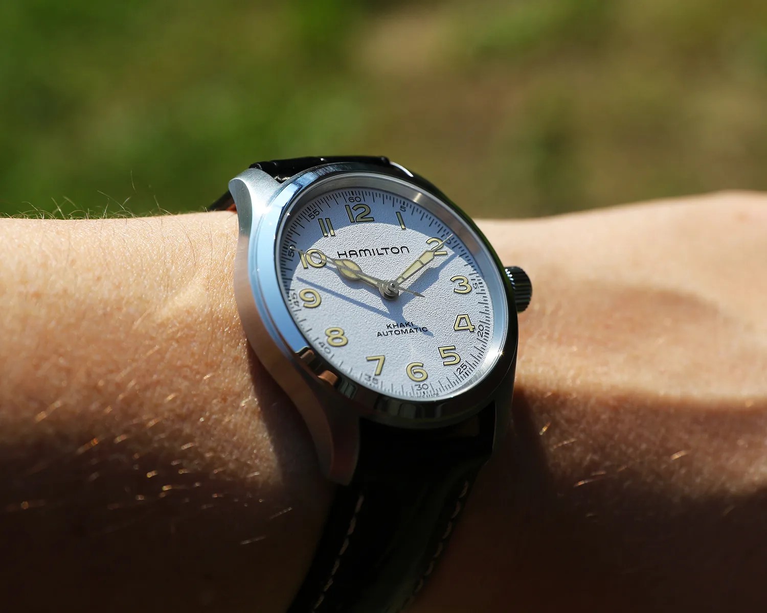hamilton watch on a mans wrist