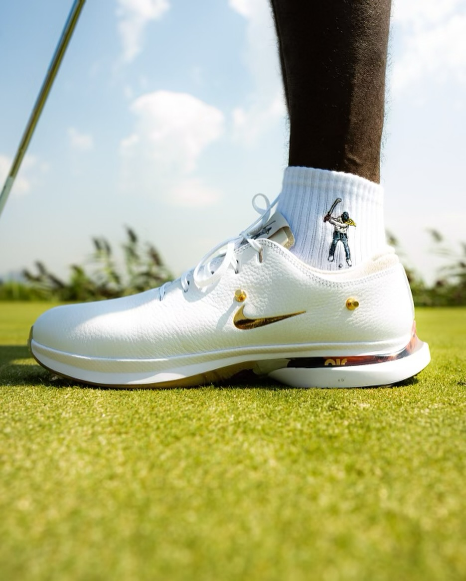 Eastside Golf x Nike Air Zoom Victory Tour 3 shown from side on golf course without the swappable Nike Swoosh branding