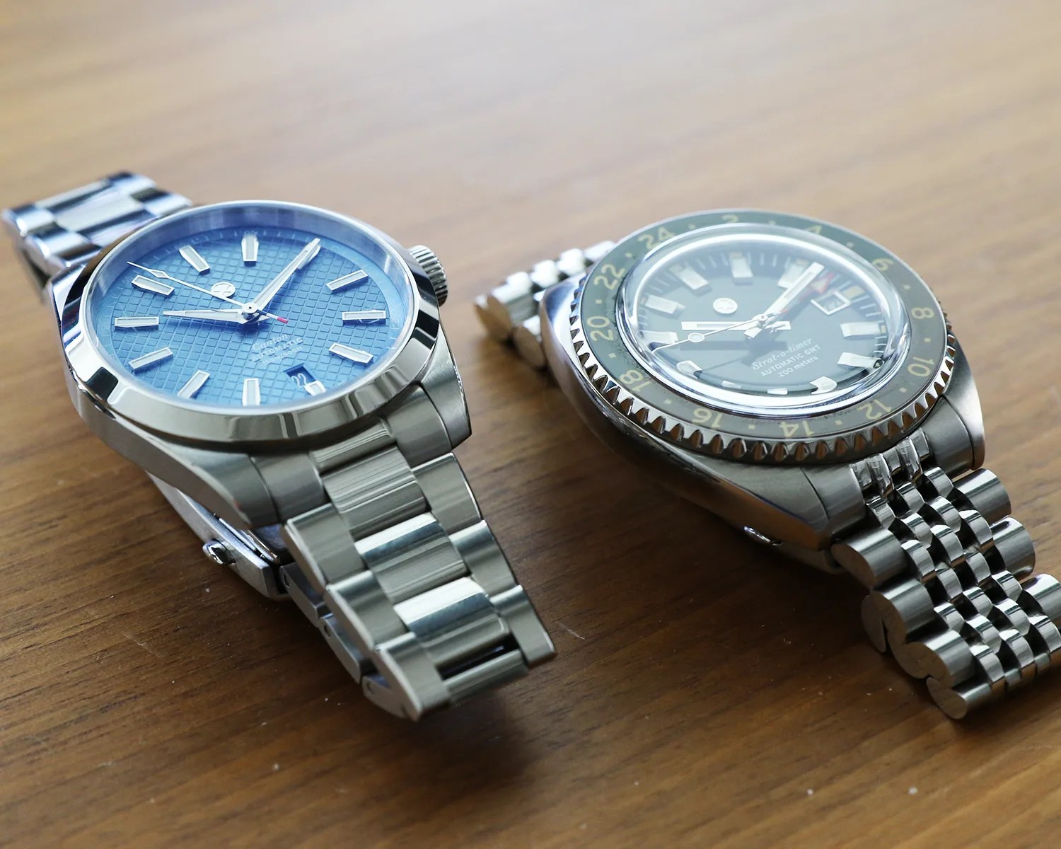 two jack mason watches on a table