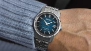 seiko watch on the wrist of a man wearing a sweater