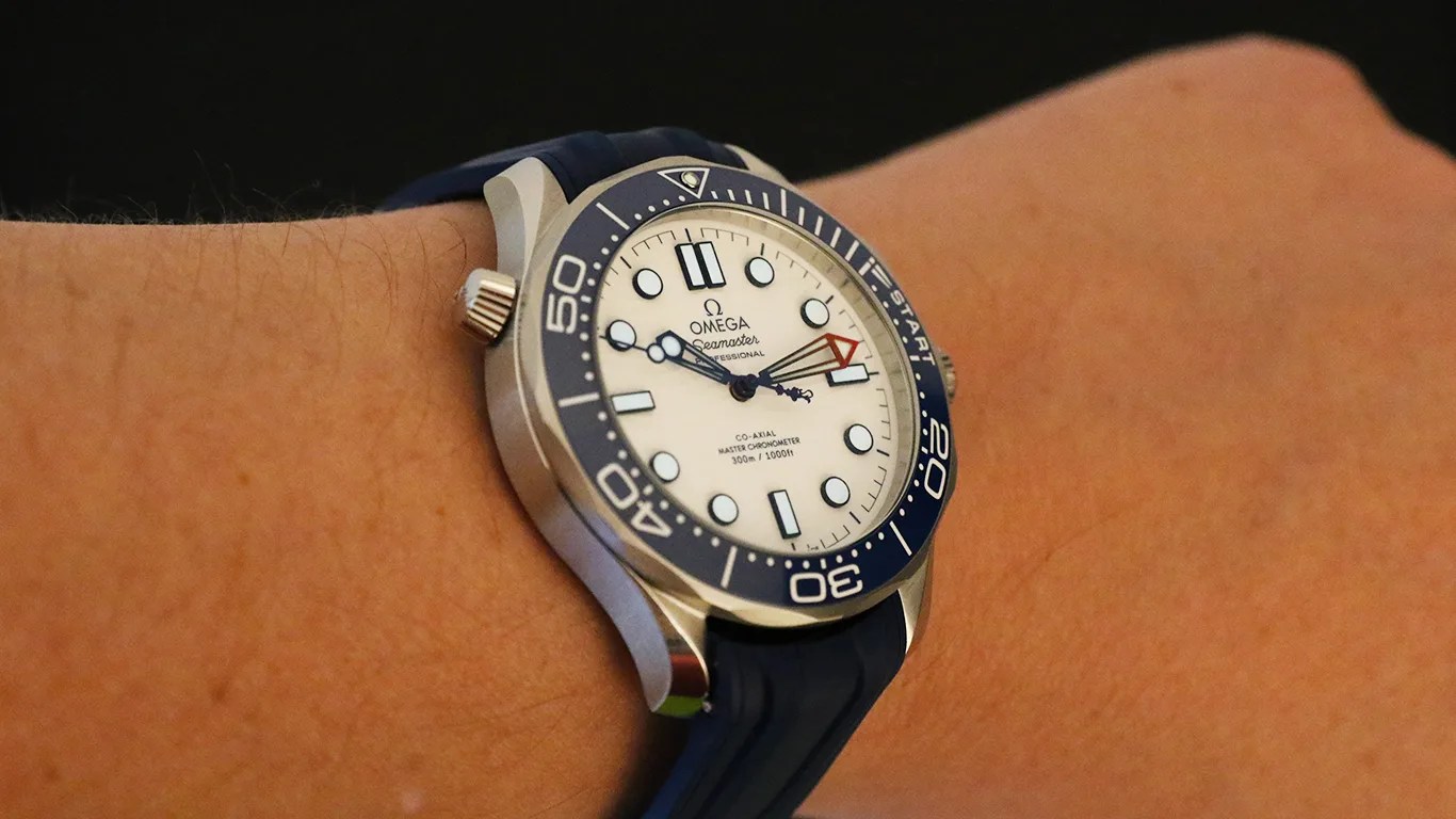omega seamaster watch on a mans wrist