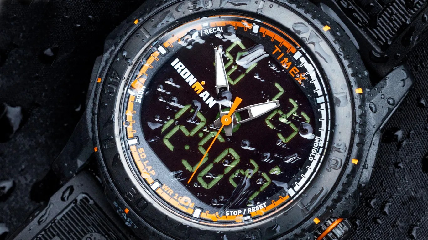 a timex ironman watch on wet black canvas