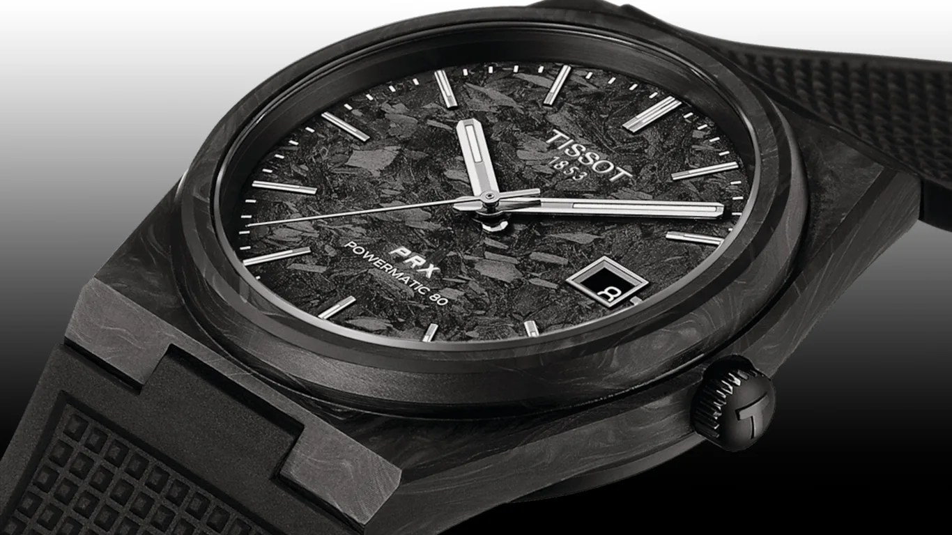 tissot watch against a black gradient background
