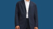 Lululemon New Venture Button-Front Blazer shown on model wearing white dress shirt against a blue background