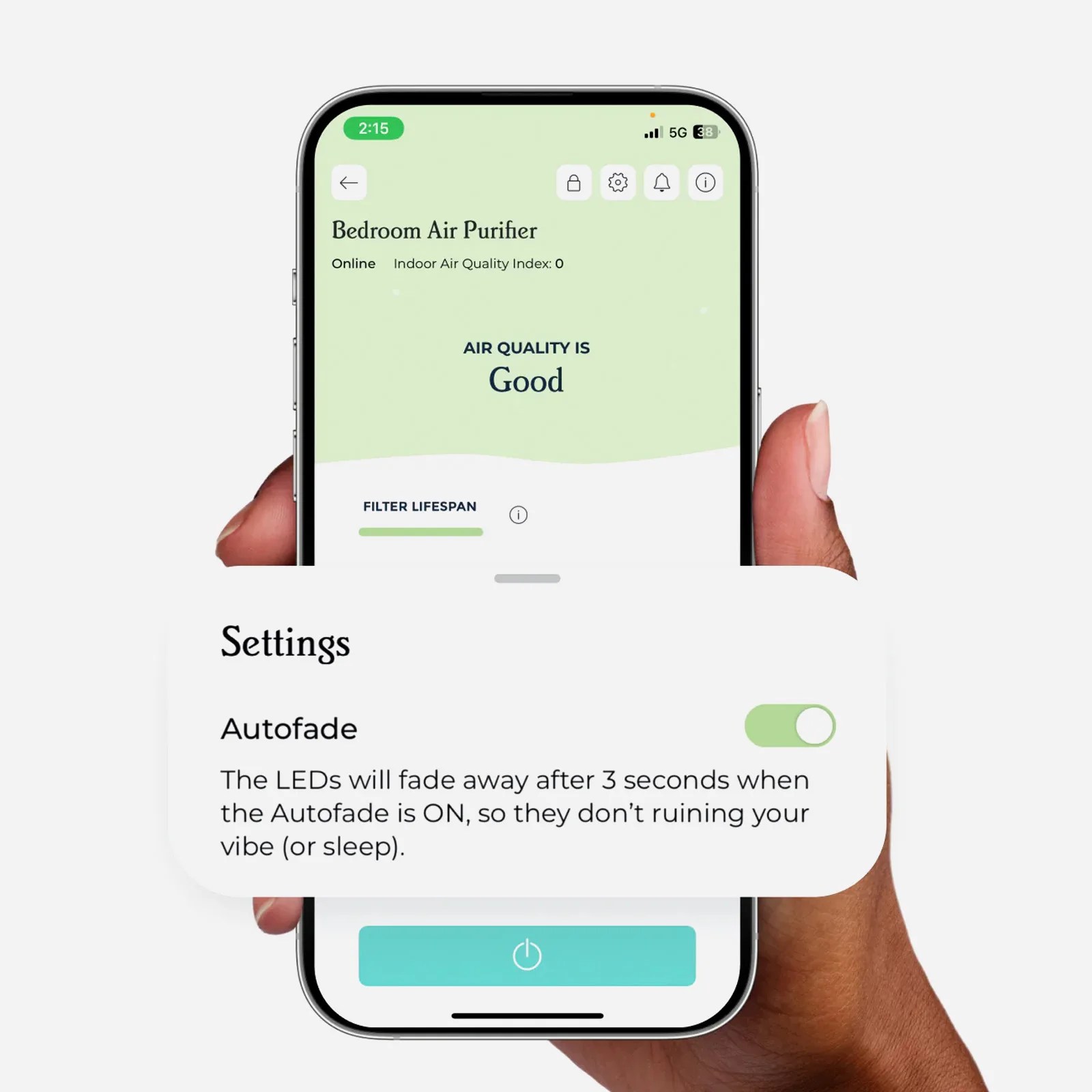 A hand holding an iPhone showing the WIndmill Air Purifier companion app. The screen shot shown highlights how users can set the purifier lights to auto fade after 3 seconds. 