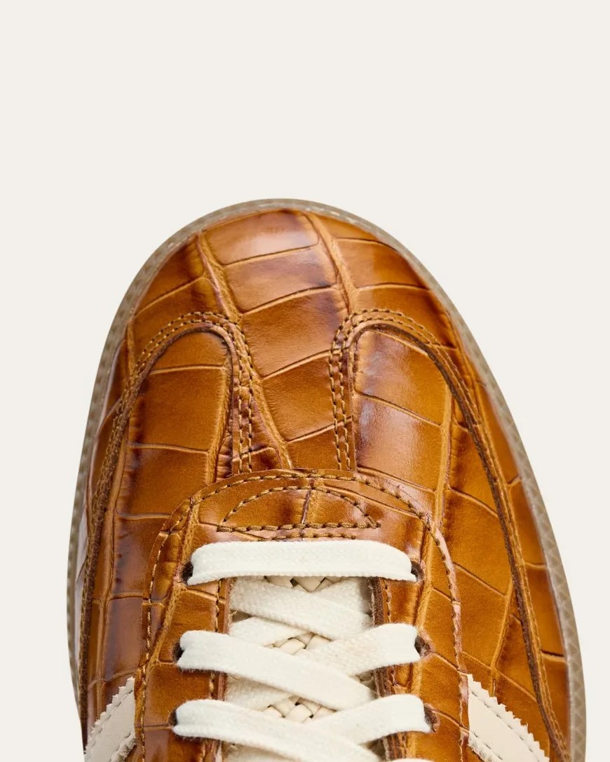toebox of tan adidas shoe