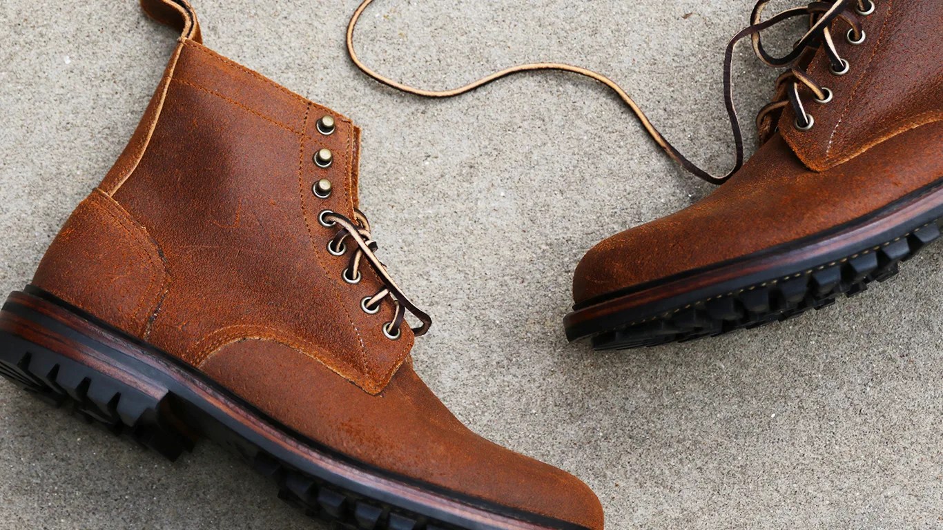billy reid x oak street boots on a cement floor