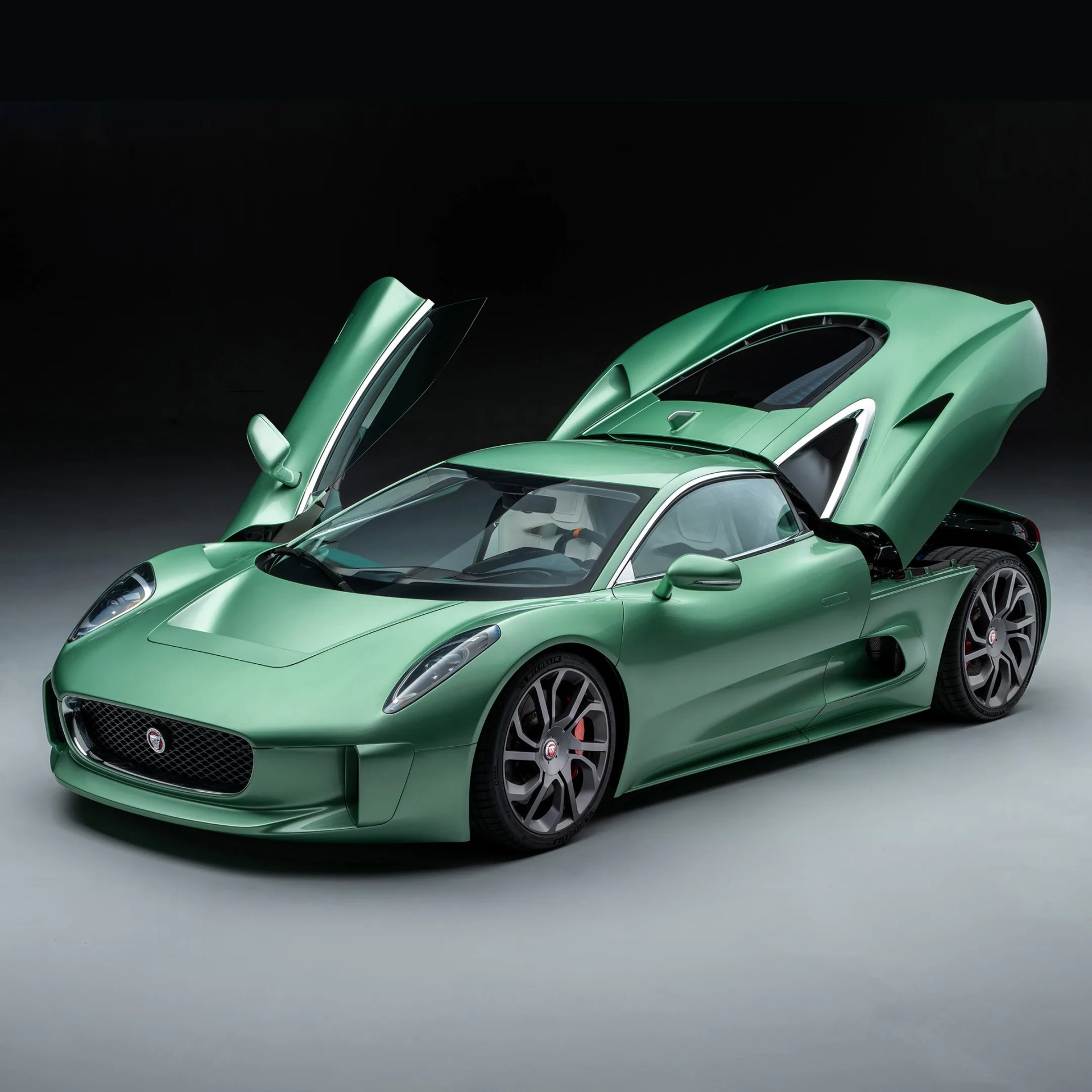a green callum jaguar c x75 sports car