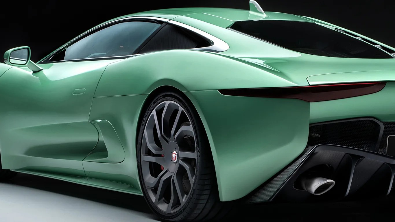 the rear driver side view of a callum jaguar c x75 sports car