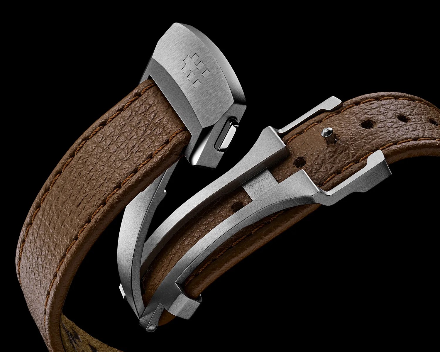 a christopher ward bel canto watch clasp on a leather strap
