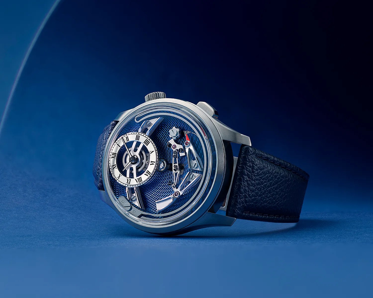 a christopher ward bel canto watch in a blue room