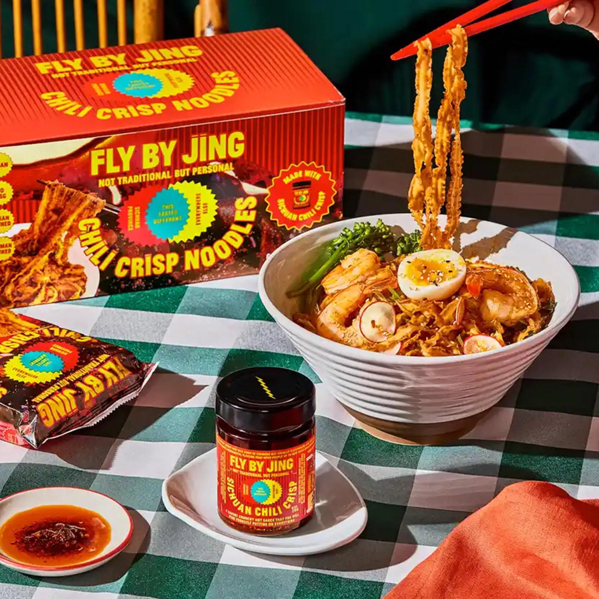 fly by jing noodles being picked up with chopsticks