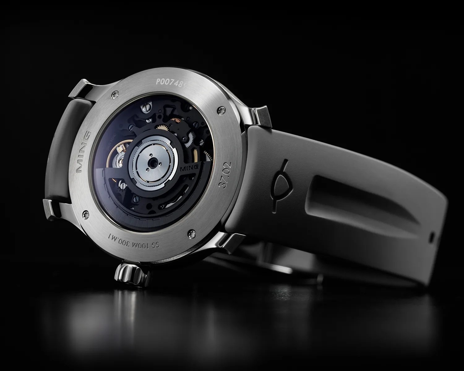 ming watch caseback showing a mechanical movement