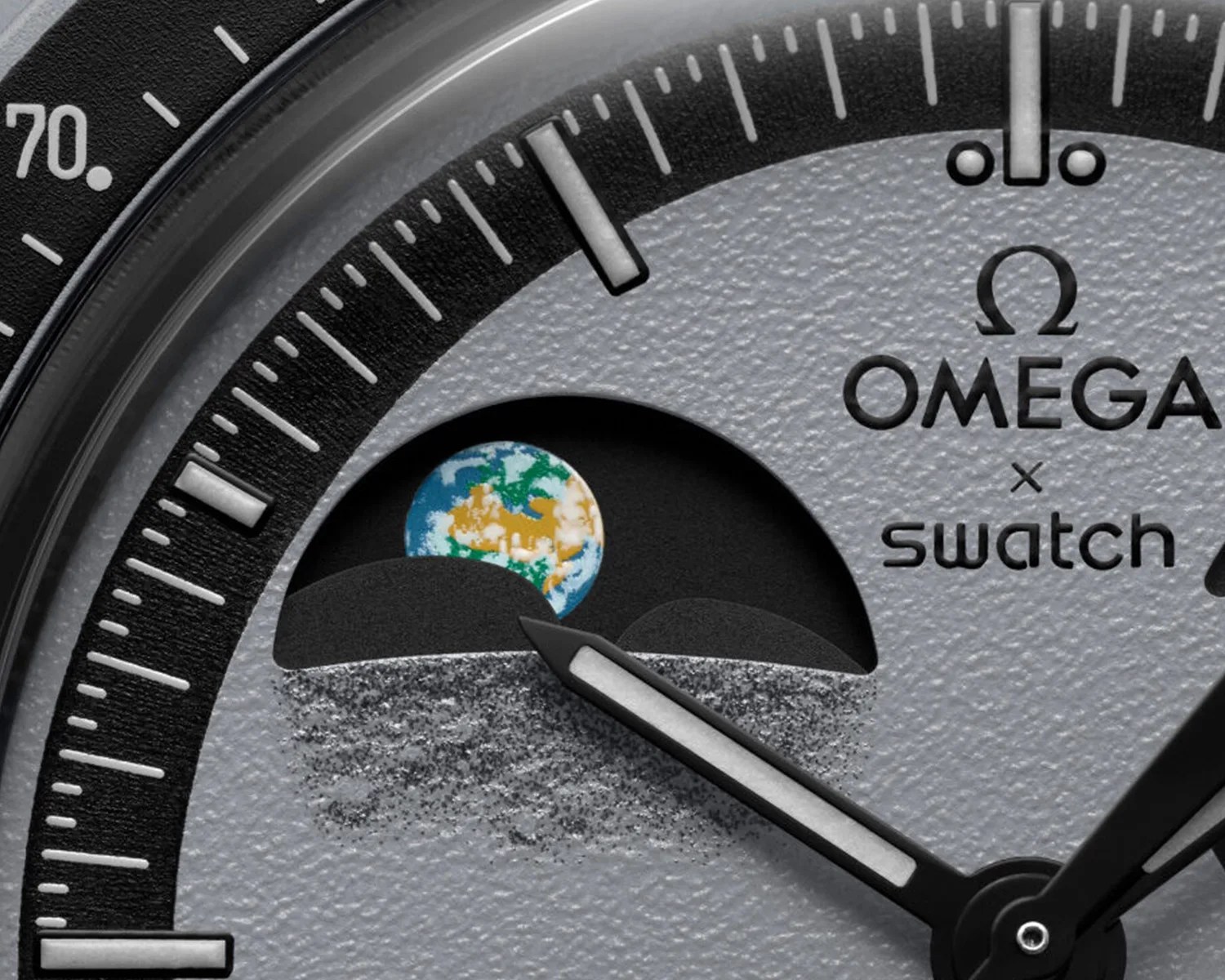 a closeup of the earthphase on a swatch moonswatch watch dial