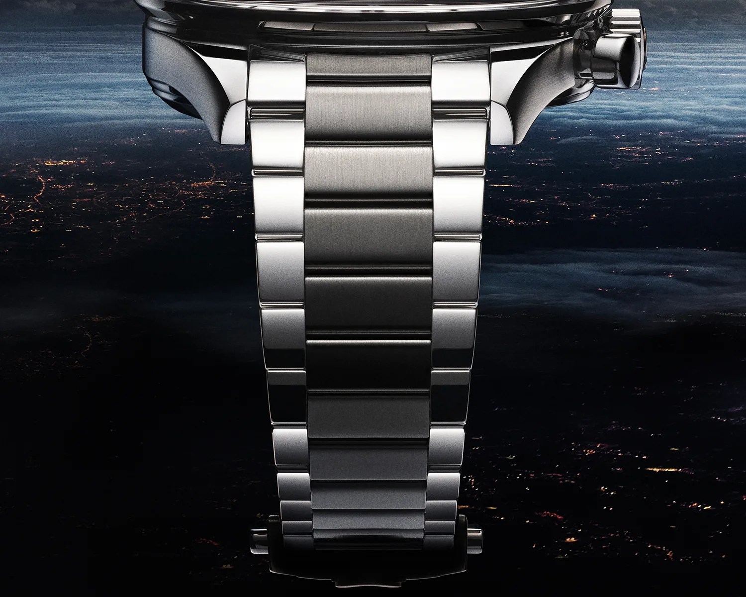 omega watch bracelet closeup with outer space in the background