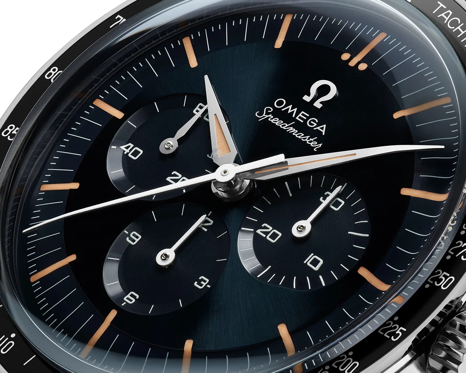 closeup of an omega speedmaster watch dial