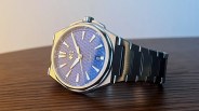 a christopher ward watch on a table