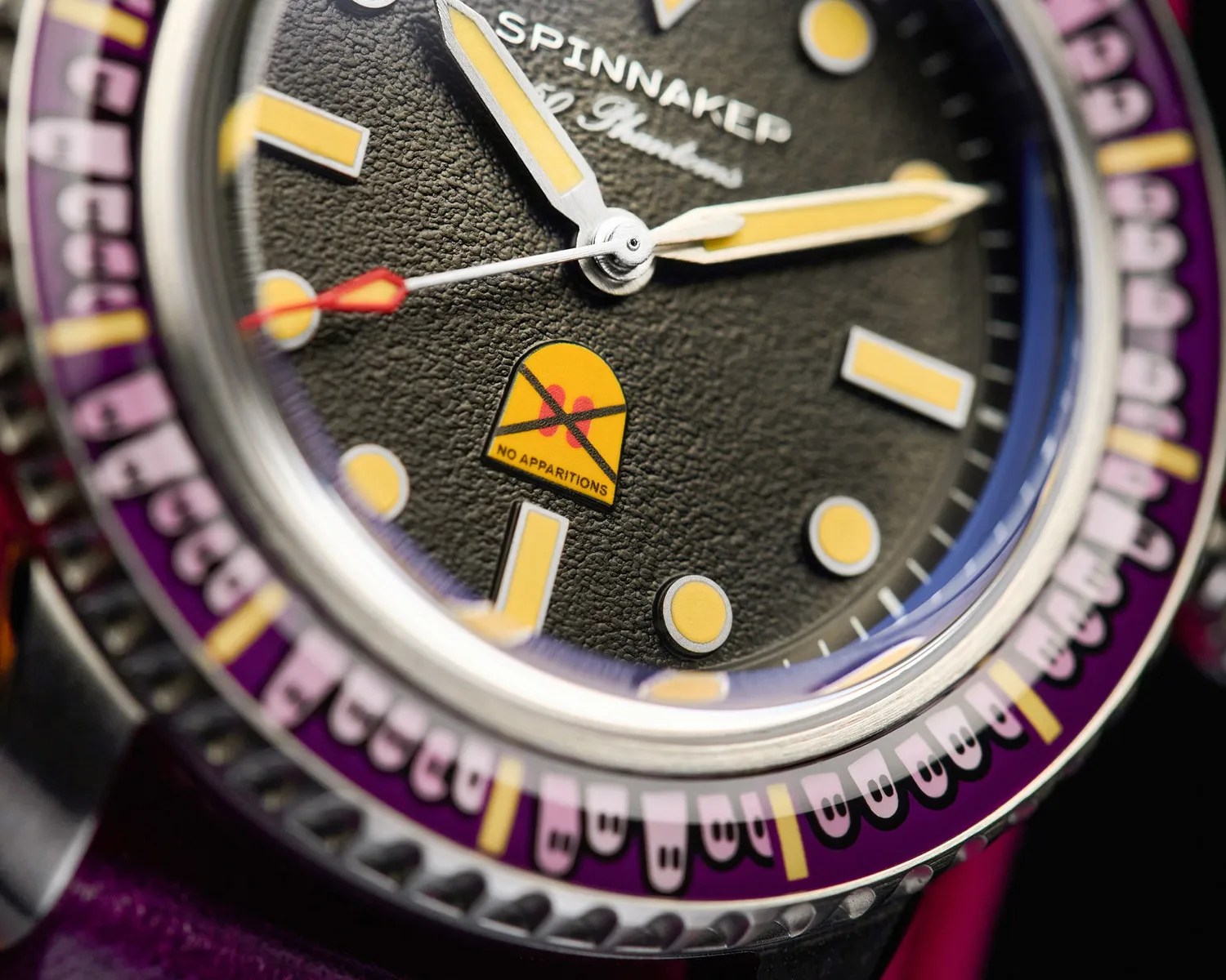closeup of a Spinnaker watch dial