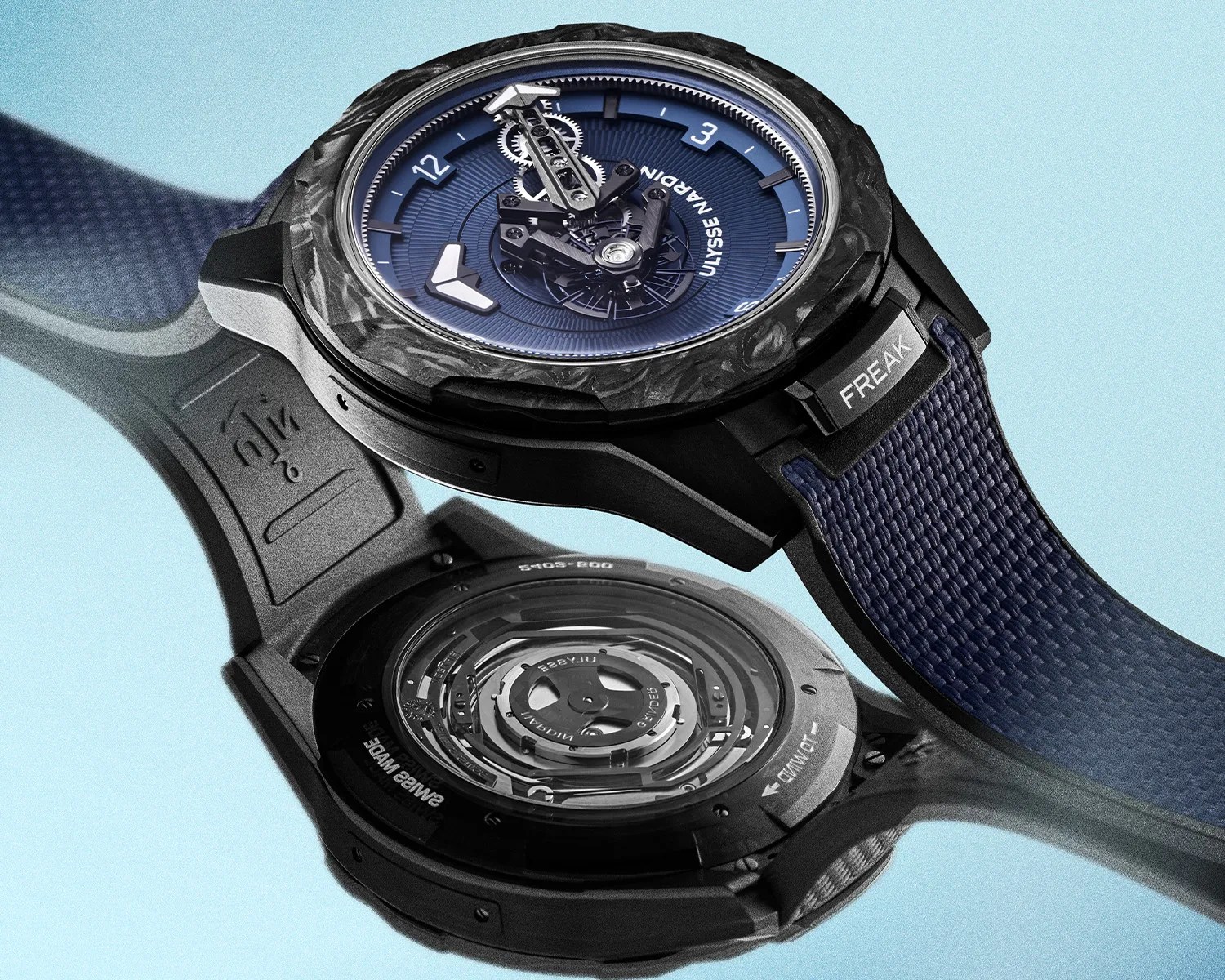 two ulysse nardin watches mirroring each other
