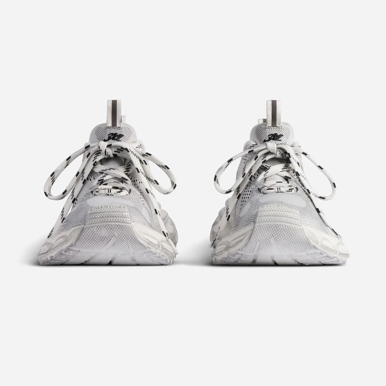 A pair of Balenciaga x Under Armour 3XL sneakers in white shown facing front against a light grey background.