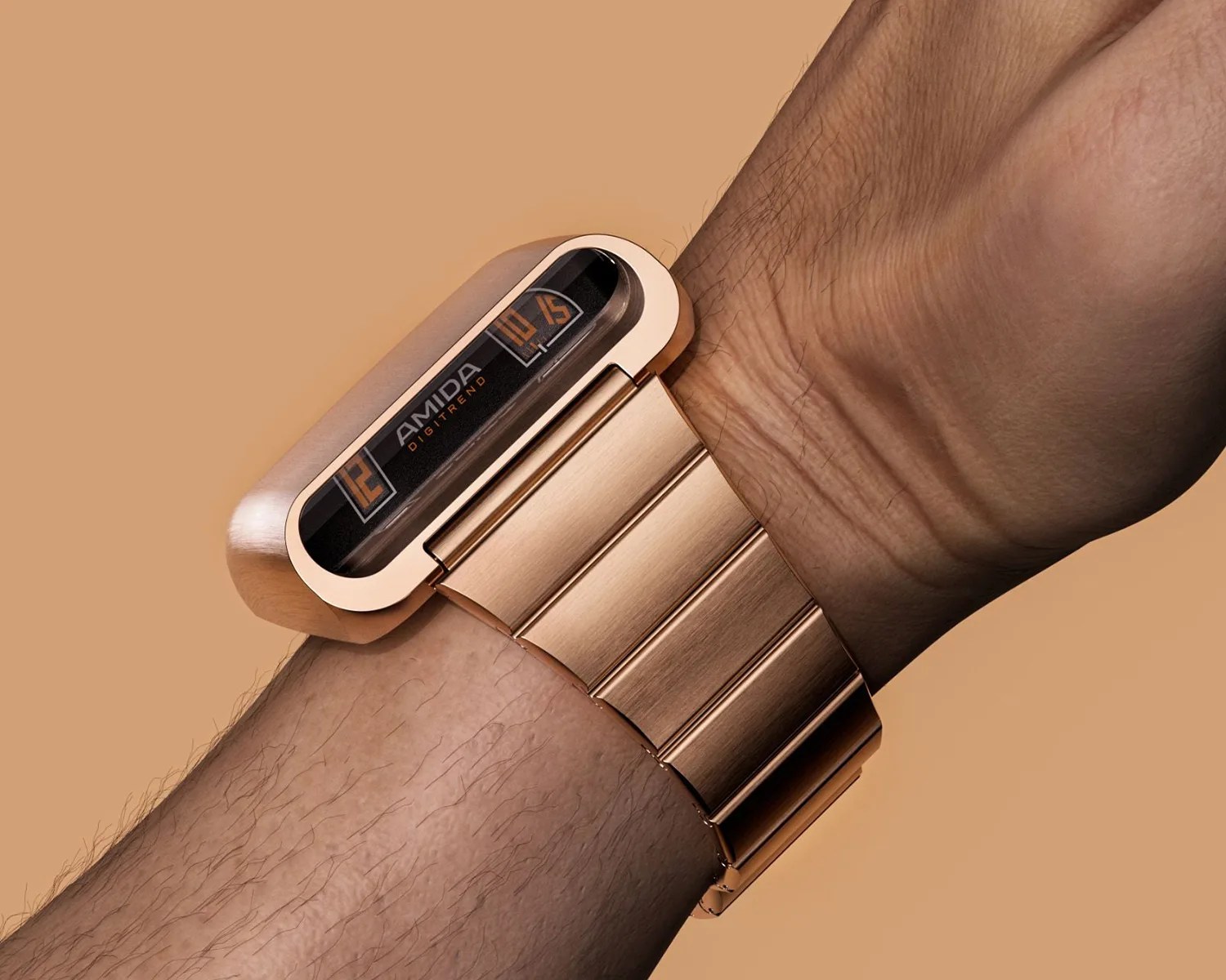 a gold amida digitrend watch on a mans wrist