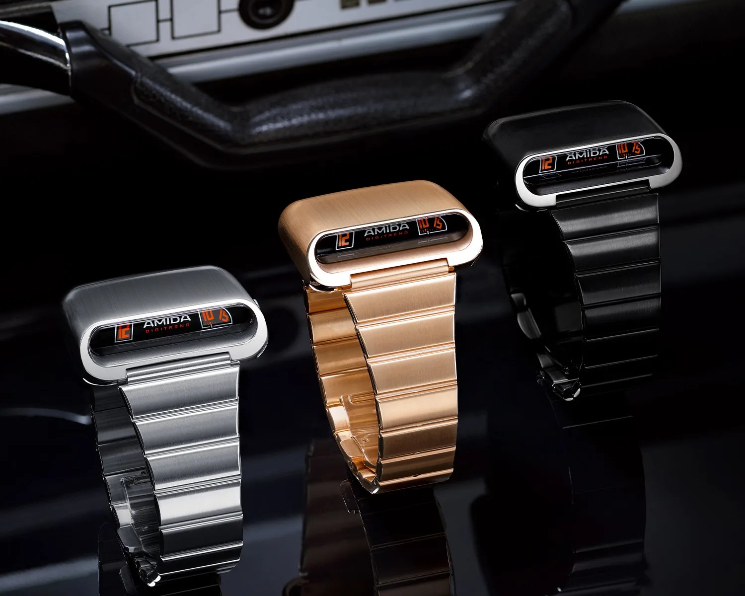 three amida digitrend watches in an old car
