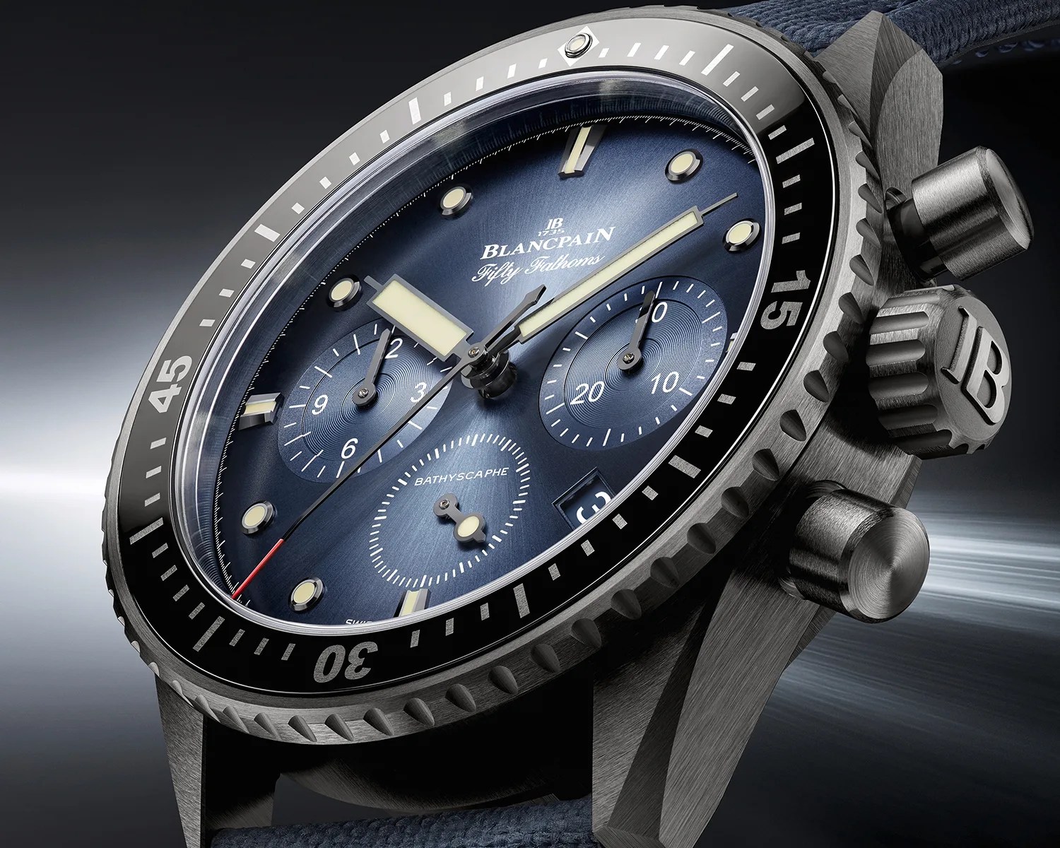 a closeup of a blancpain fifty fathoms ceramic chronograph dive watch