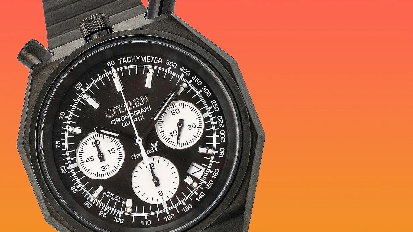 a citizen ground y chronograph watch against an orange gradient background