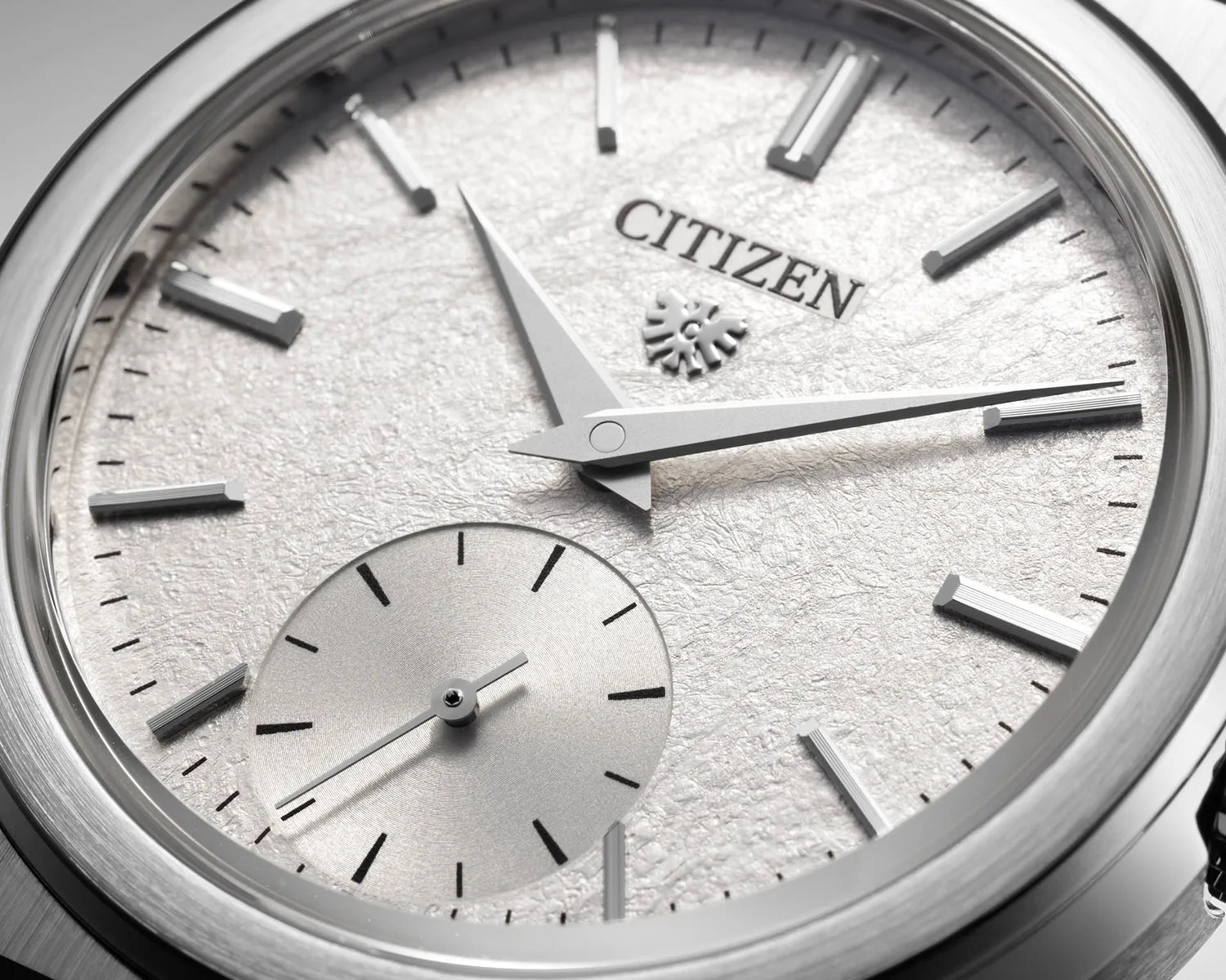 a closeup of a citizen watch dial