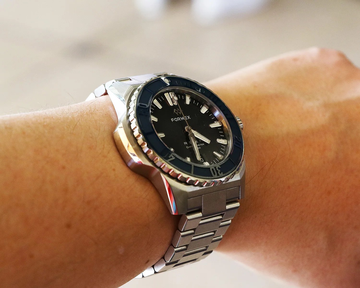 a formex watch on a mans wrist