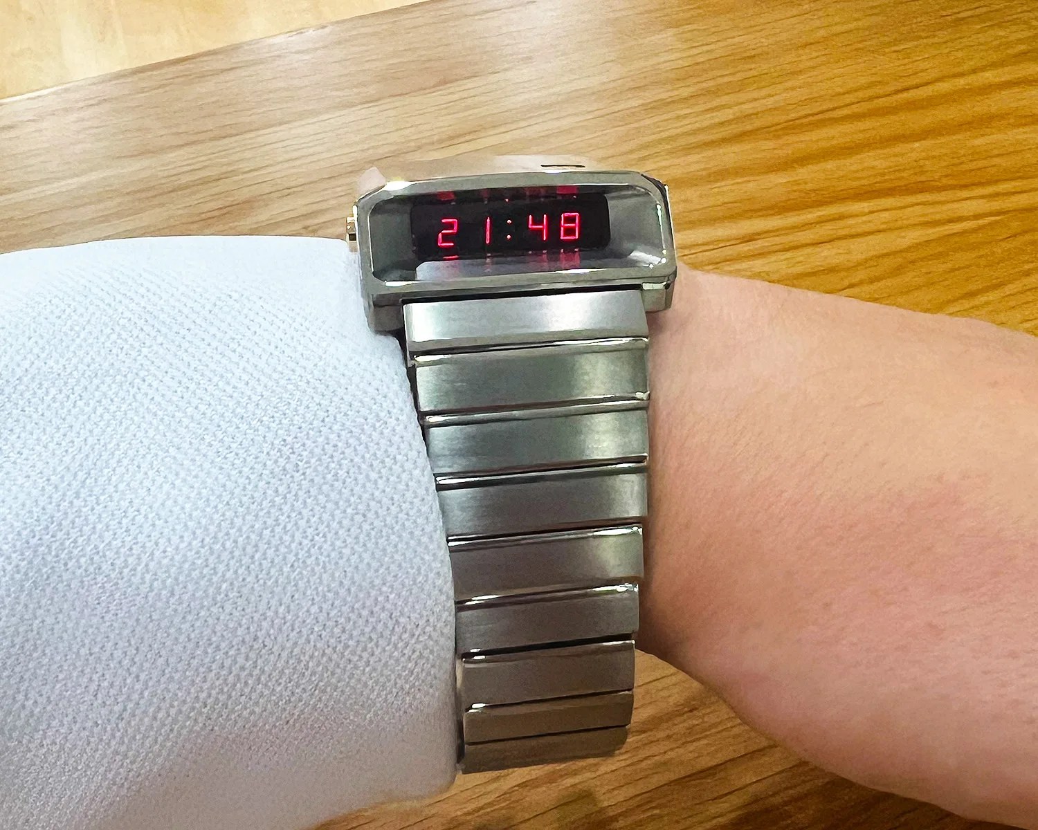 a girard perregaux casquette digital watch on a mans wrist