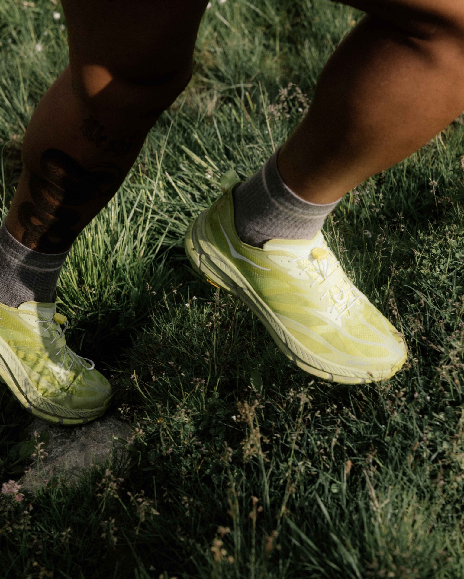green hoka shoe