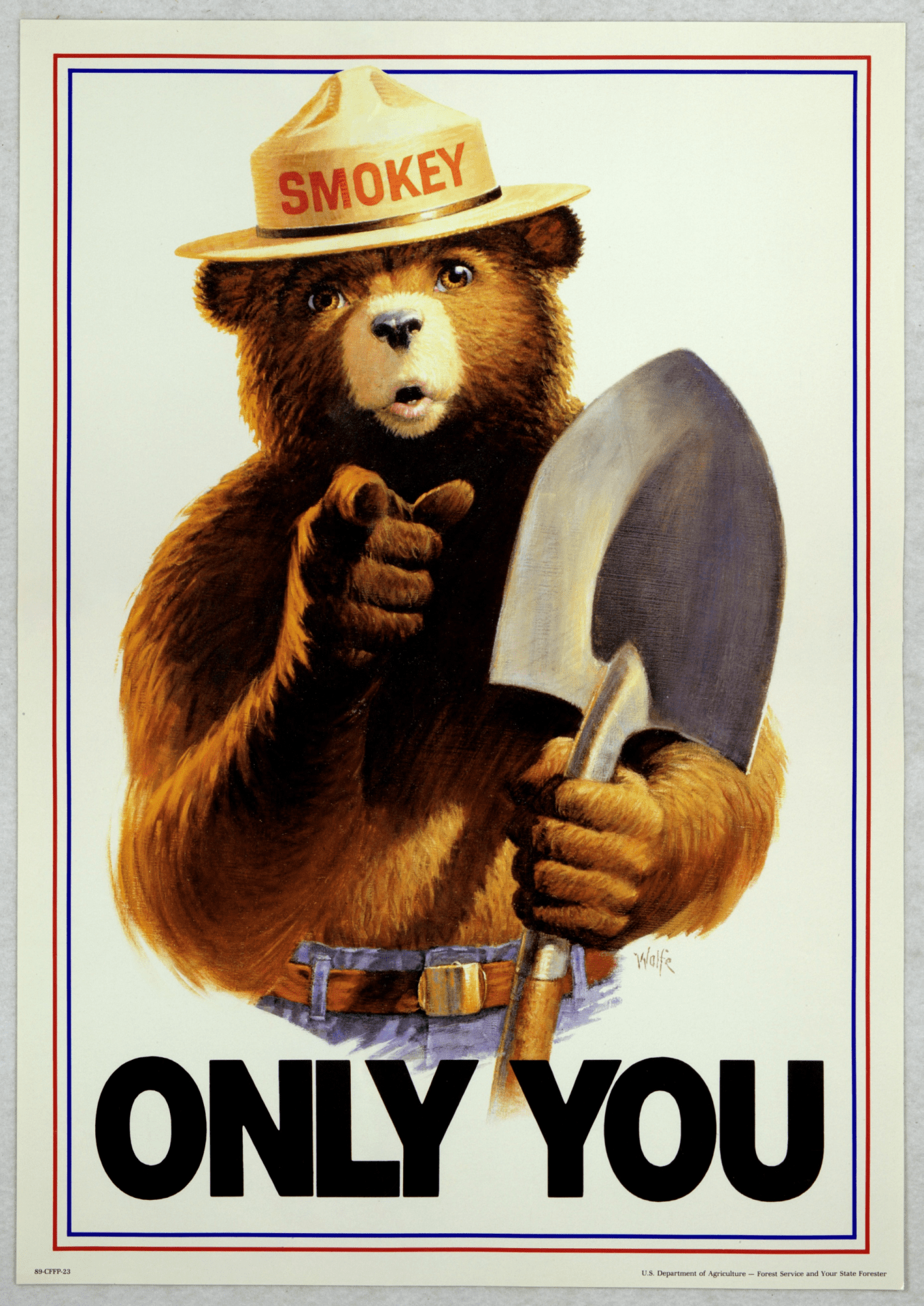 1989; Smokey Bear poster showing a half body image of Smokey pointing at the audience with one hand while holding a shovel in the other hand. Poster reads "Only You". This work is maintained in the National Agricultural Library, in Beltsville, MD.