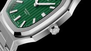 a closeup of a maen manhattan watch that resembles a patek cubitus