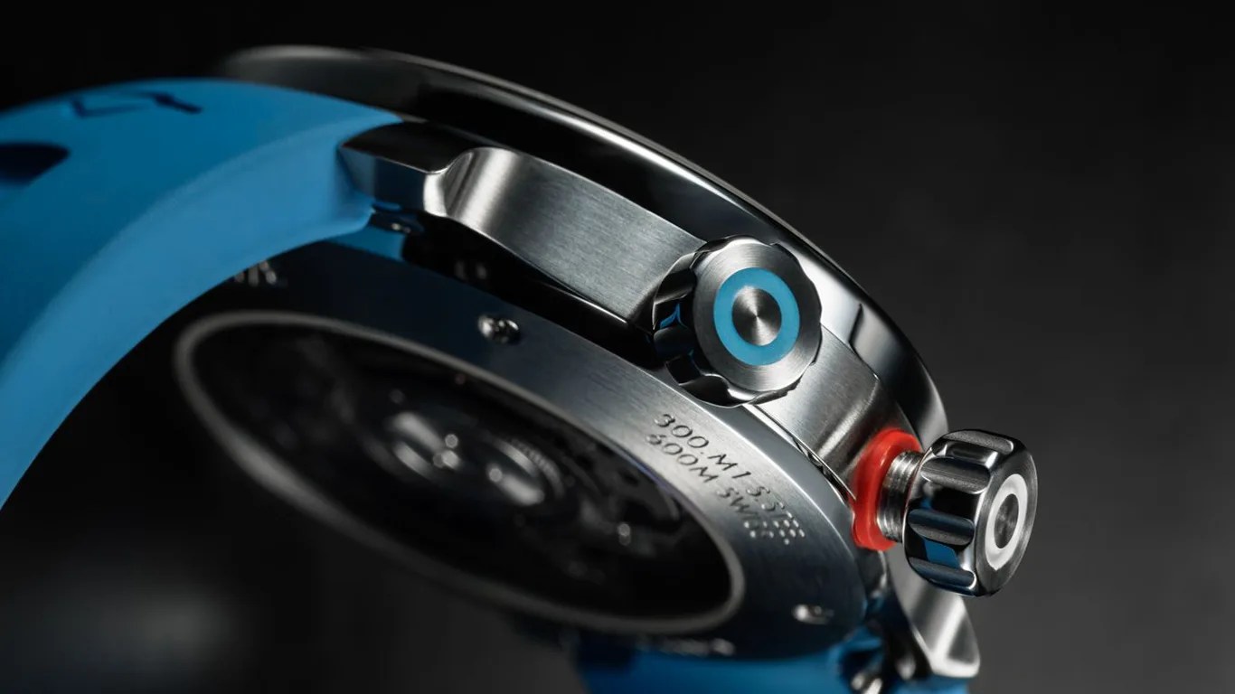 a closeup of the crowns on a ming dive watch