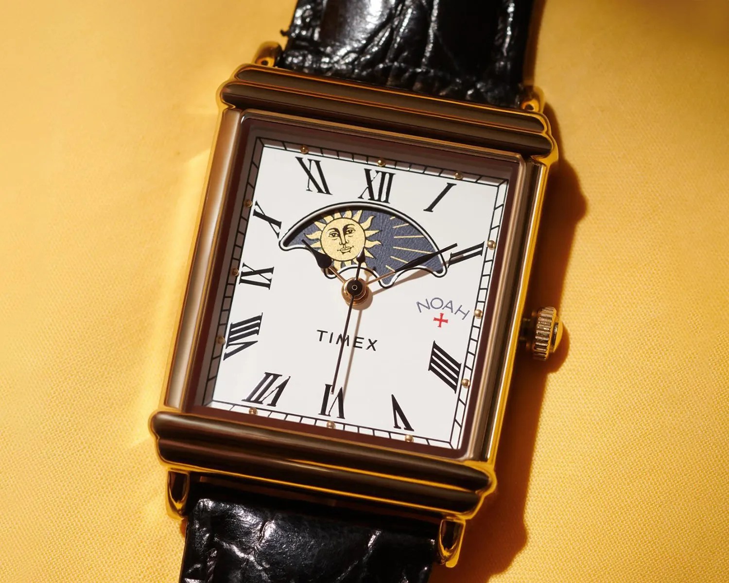 a timex x noah dress watch on a yellow background