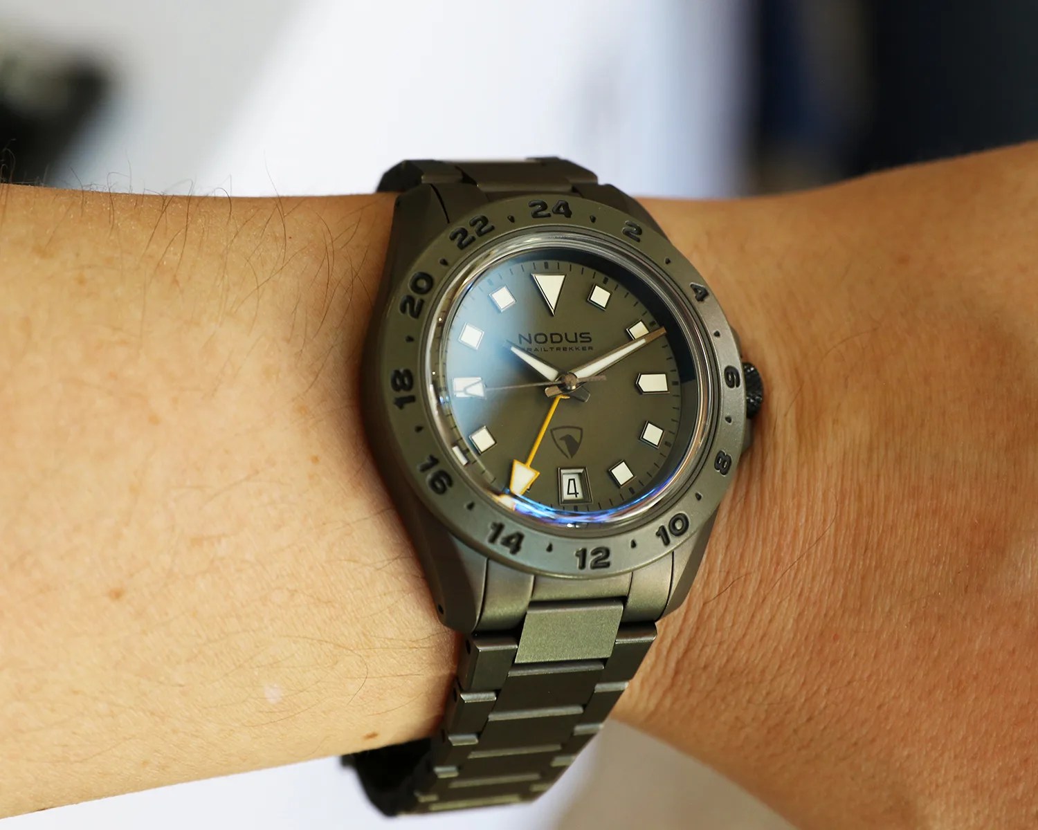 a nodus x raven watch on a mans wrist