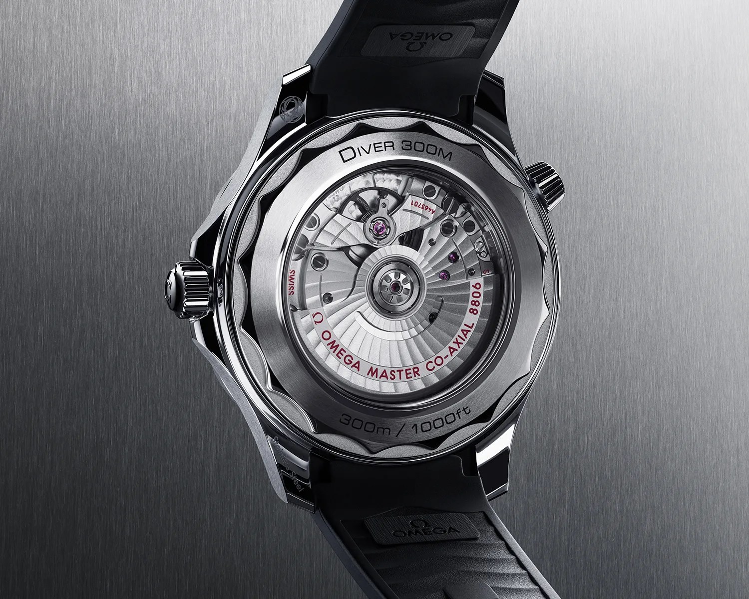 the caseback showing the movement on an omega seamaster dive watch