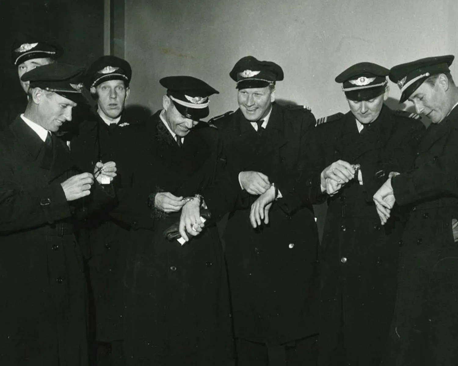 a group of SAS pilots in the 1950s wearing Universal Geneve polerouter watches