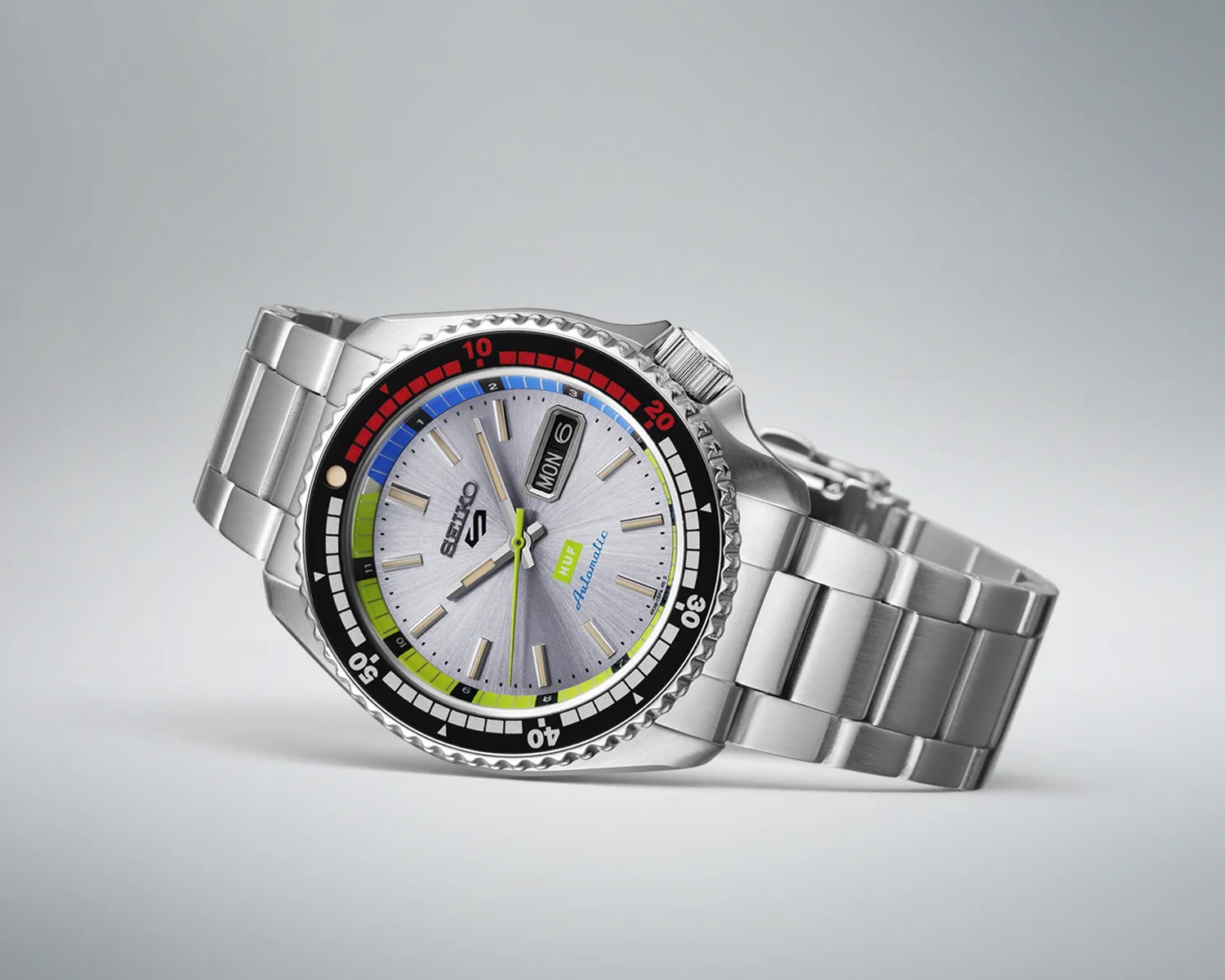 a seiko x huf watch on its side